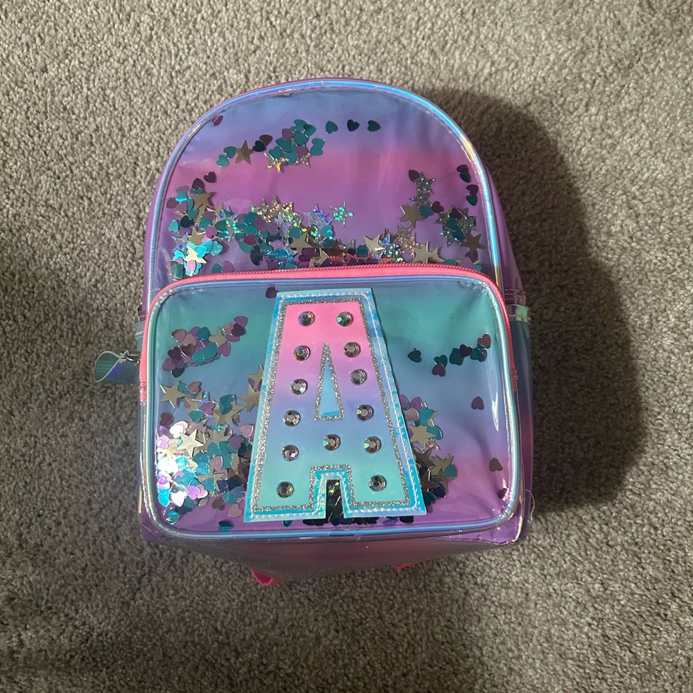 Claire’s Rainbow Initial Backpack NWT